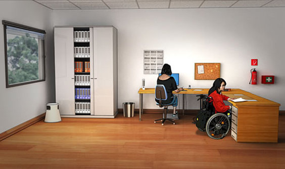 Zwei Frauen arbeiten in einem Büro der Werkstatt-Verwaltung. Eine auf einem Schreibtischstuhl, die andere im Rollstuhl.